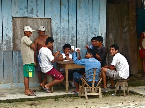 Guys Playing Cards in the Shamans' Village