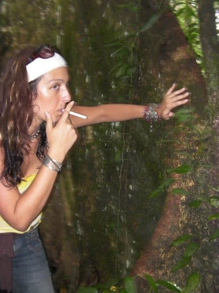 Meghan giving tobacco offering to Lupuna Tree